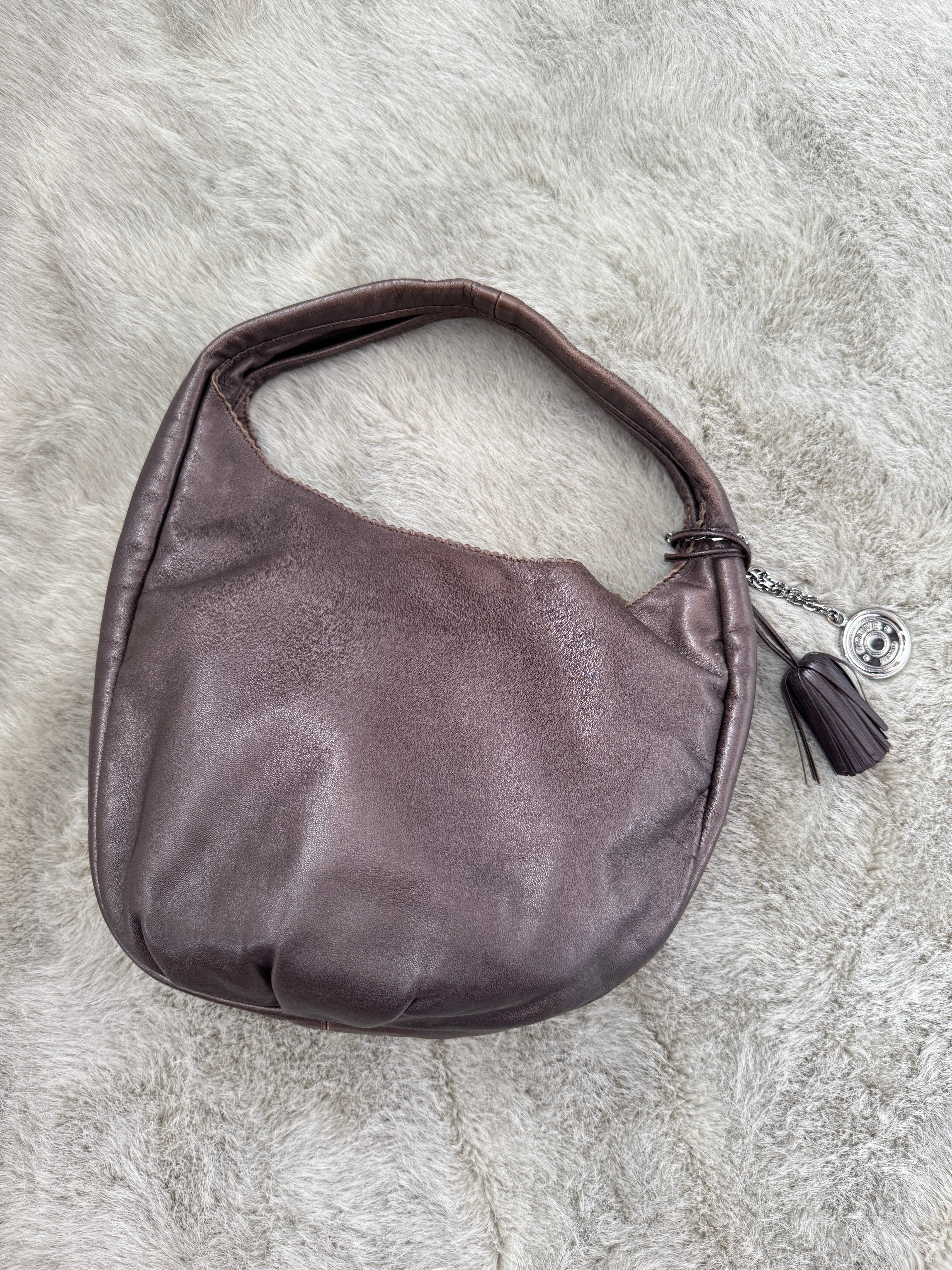 Viento Slouchy Shoulder Bag with Tassel and Charm in Brown Lambskin Leather